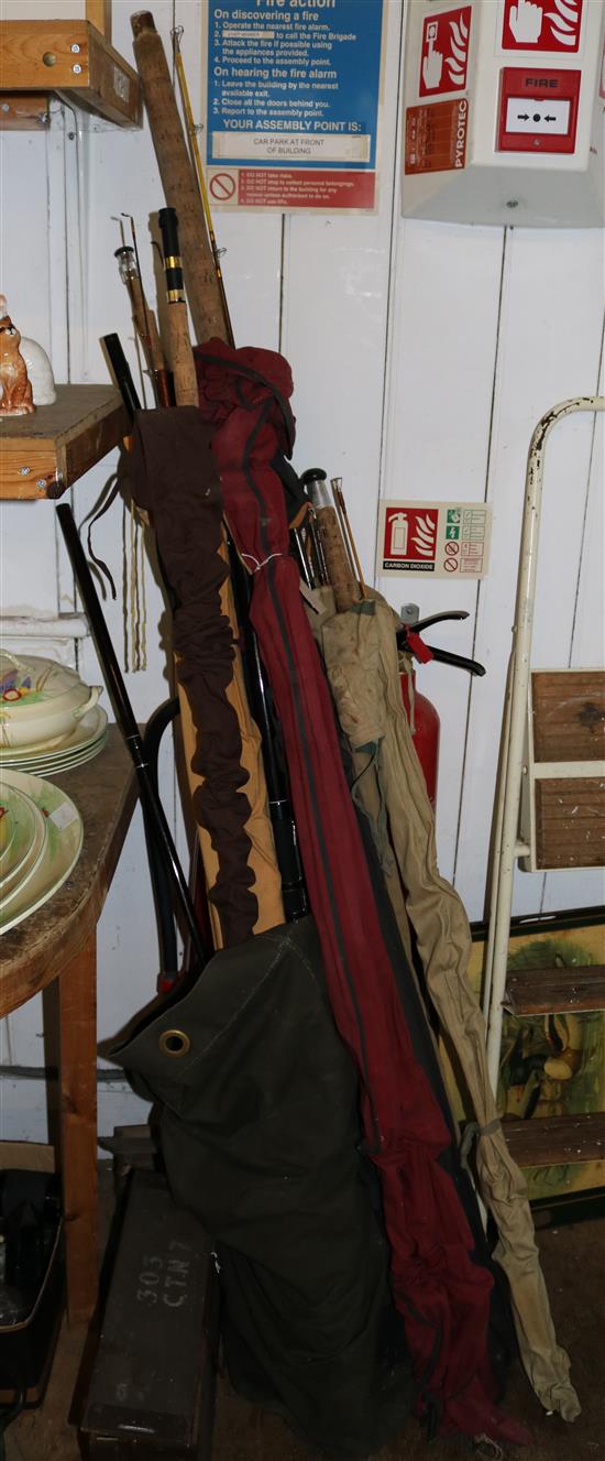Eleven various fishing rods inc Daiwa, Minor Match etc, British Army ammunition case, two kitbags, belts etc